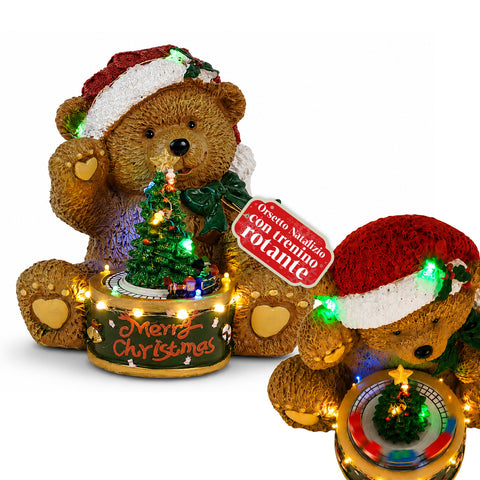Podświetlany świąteczny miś z obracającym się pociągiem i pozytywką, Teddy XMAS Bear Station, świąteczna dekoracja LED z poliresiny 20,5 cm
